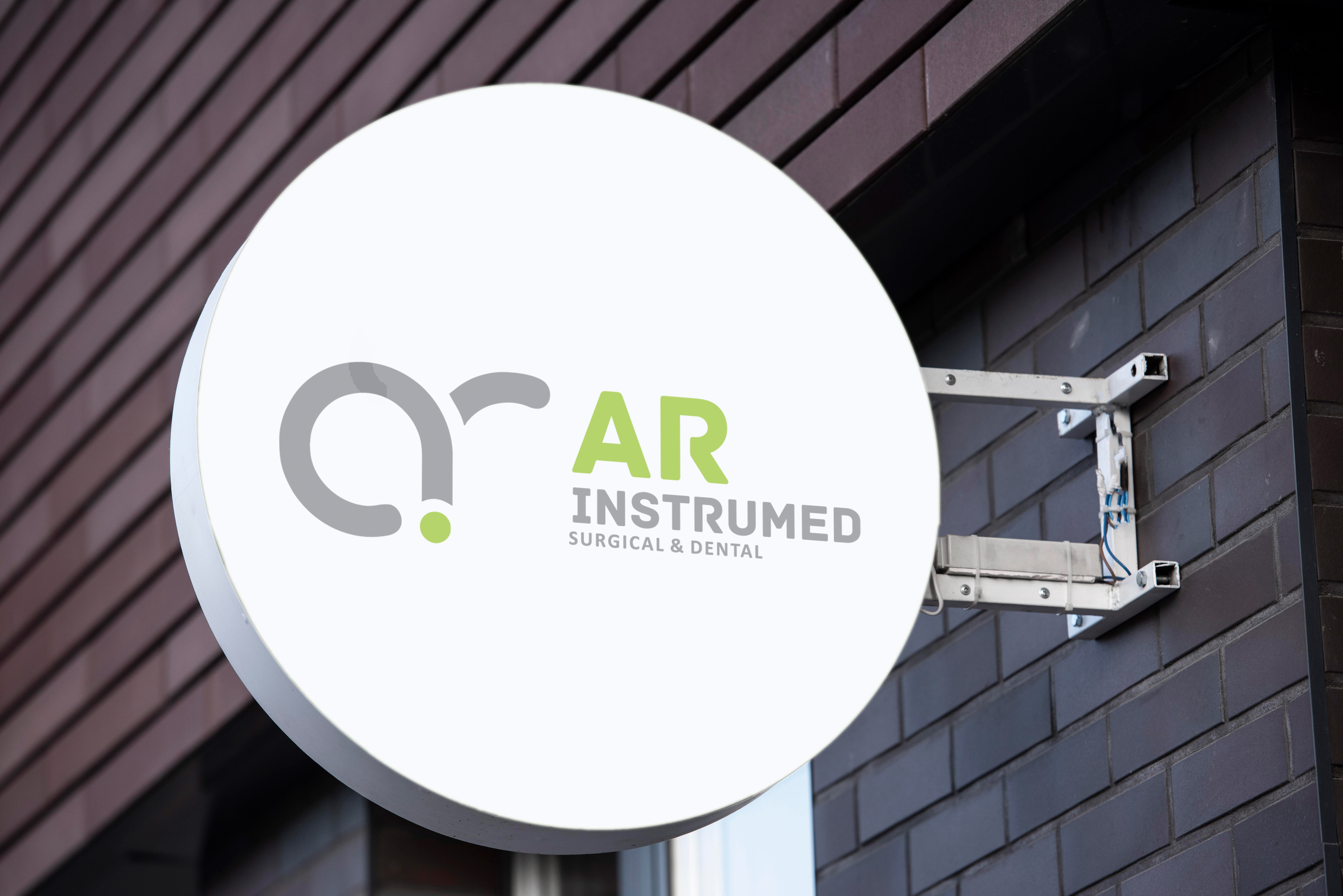 Round outdoor signage mockup featuring the AR Instrumented Surgical & Dental logo mounted on a modern building, showcasing professional healthcare branding and medical clinic signage (Variation 2).